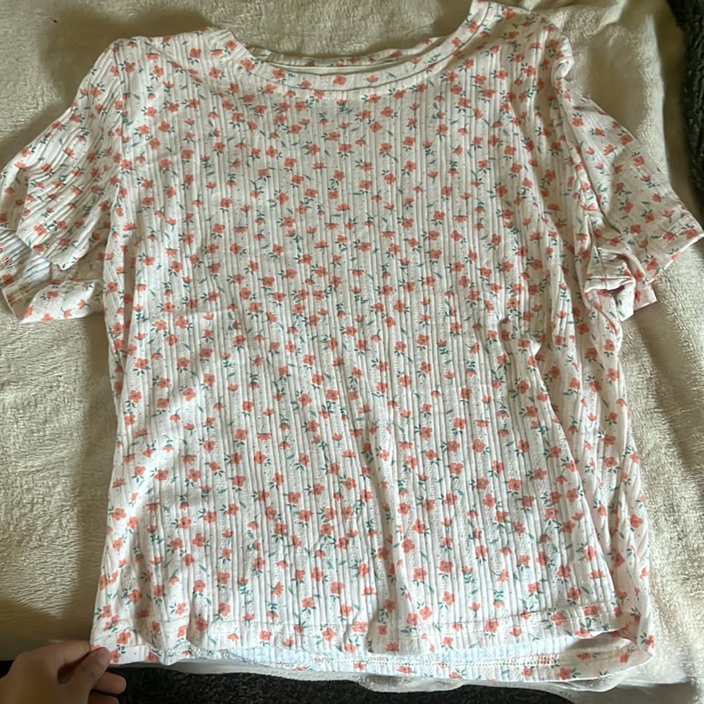 Blouse orange w orange flowers on them